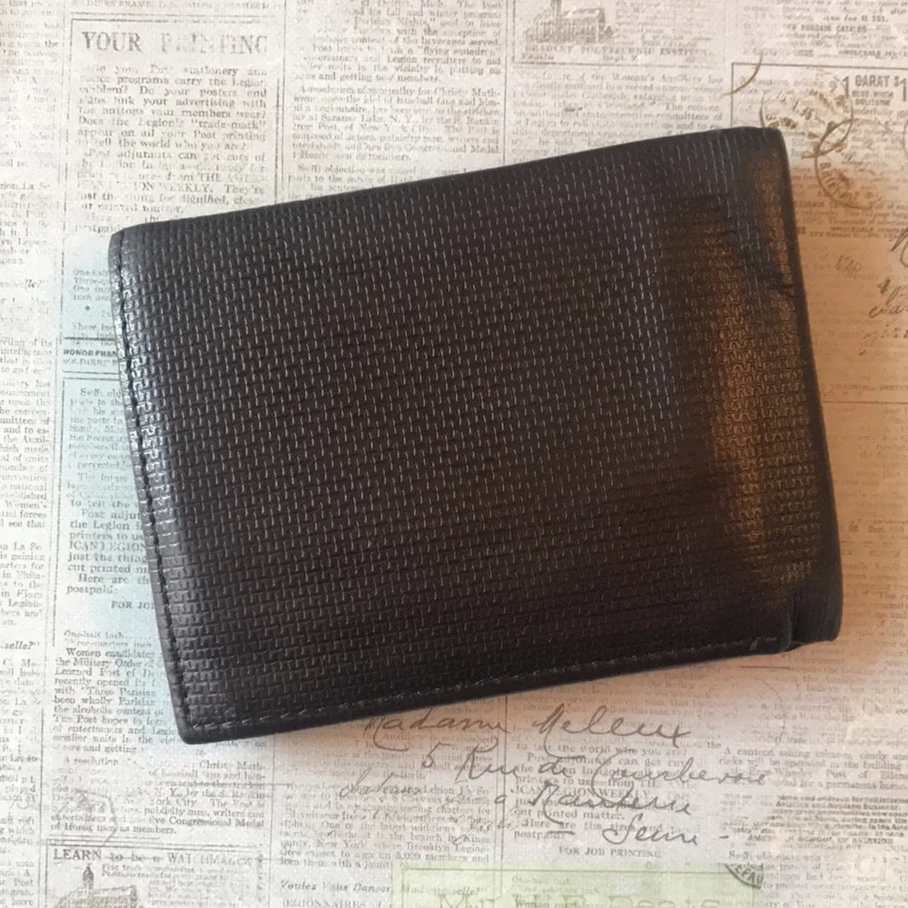 Calvin Klein Textured Leather Bi-Fold Wallet